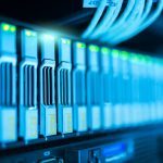 Detailed image of a server rack with glowing lights in a modern data center.